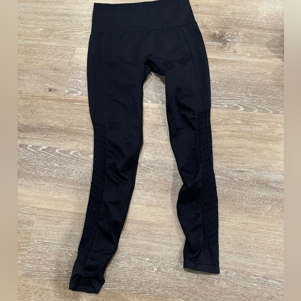 Black Fabletics leggings with see through detail on legs